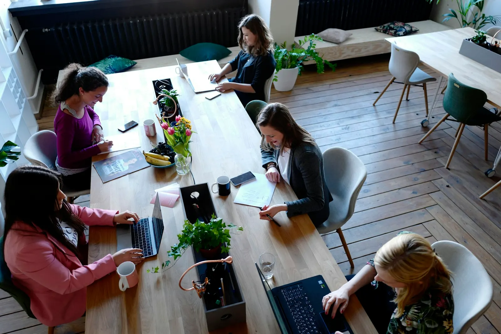 A team working at a long table